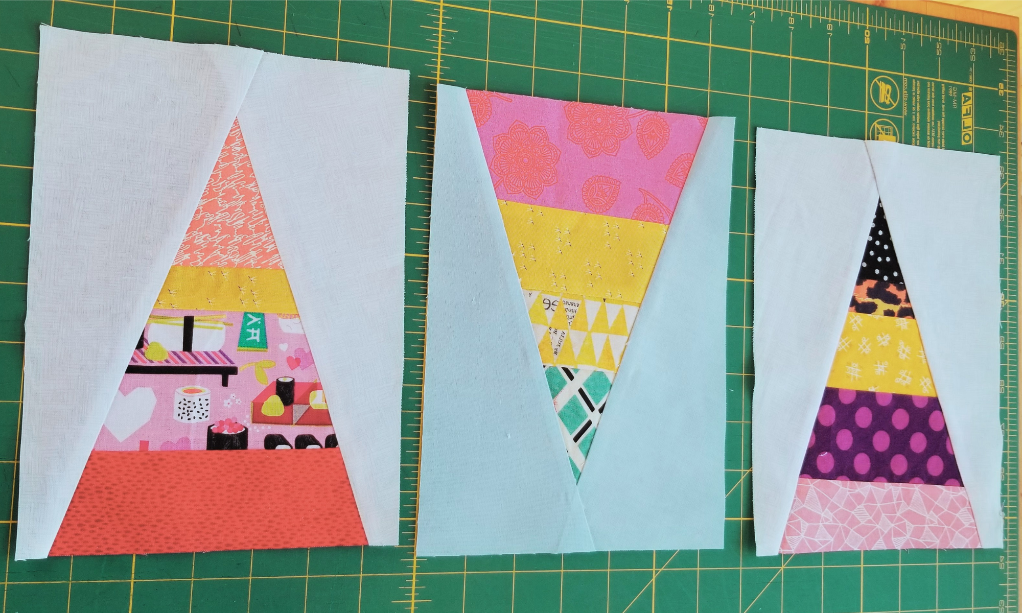 three scrappy triangle quilt blocks