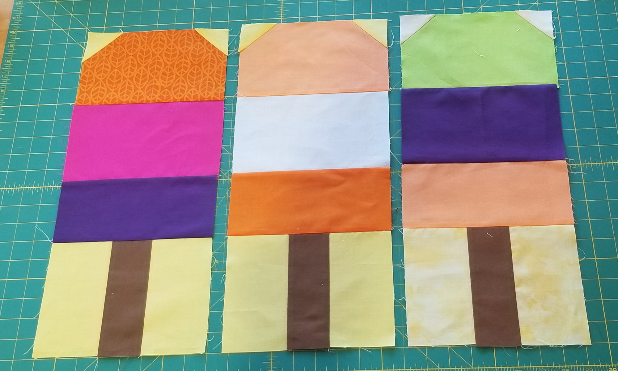 3 ice pop blocks on a cutting mat